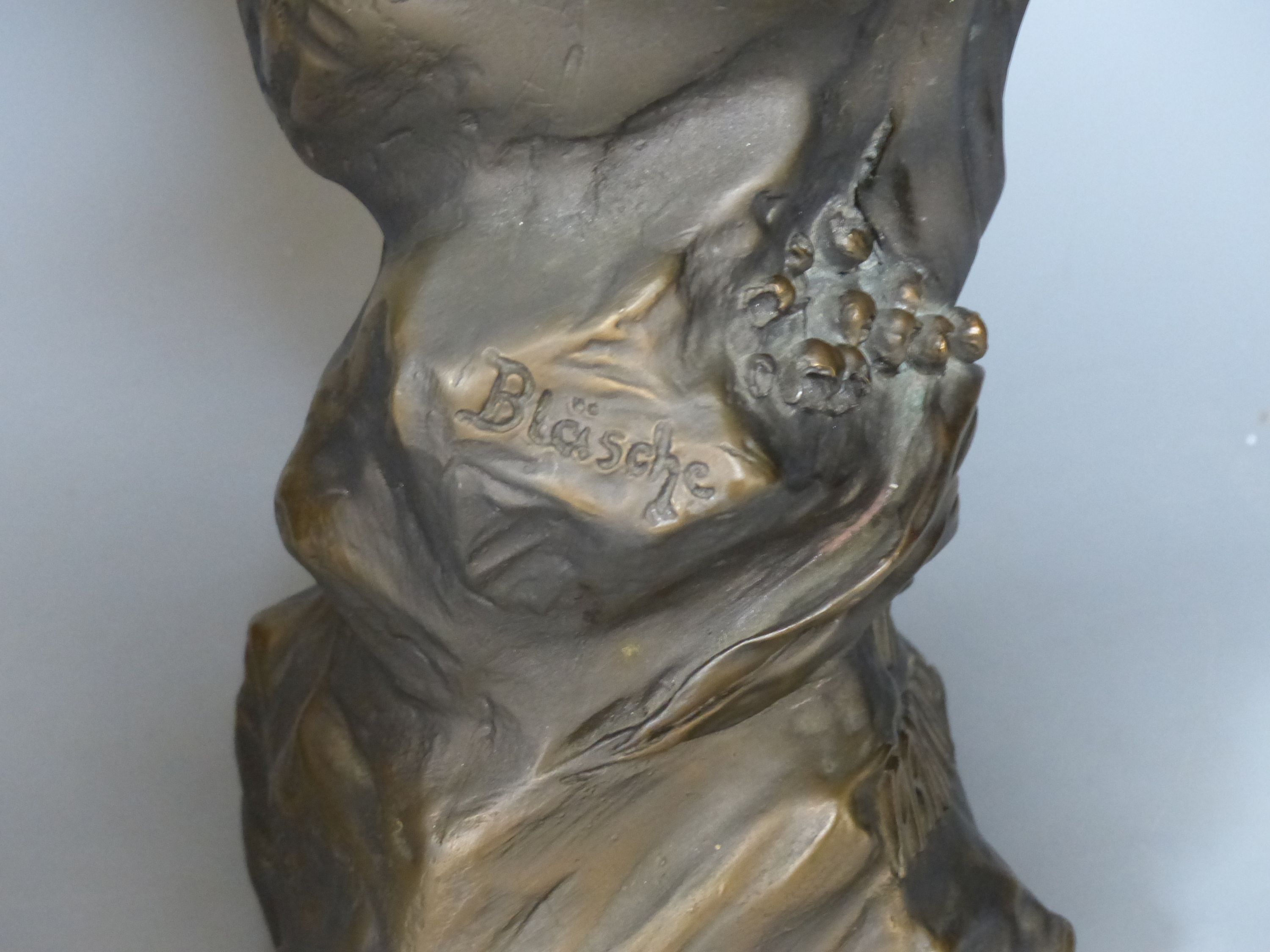 An Art Nouveau style composition bust of a girl, height 60cm